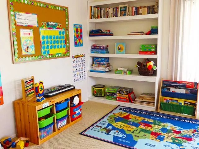 The actual ABC Time Preschool classroom with books, learning materials, and a colorful rug